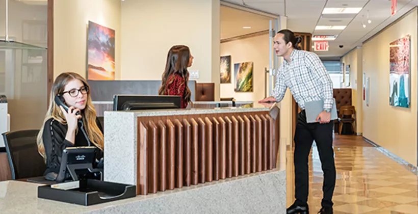 Coworking at Williams Tower, Houston, a trained team to assist clients. 