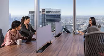 Modern coworking space at 155 North Wacker, Chicago, where clients enjoy fast Wi-Fi and stunning city views.